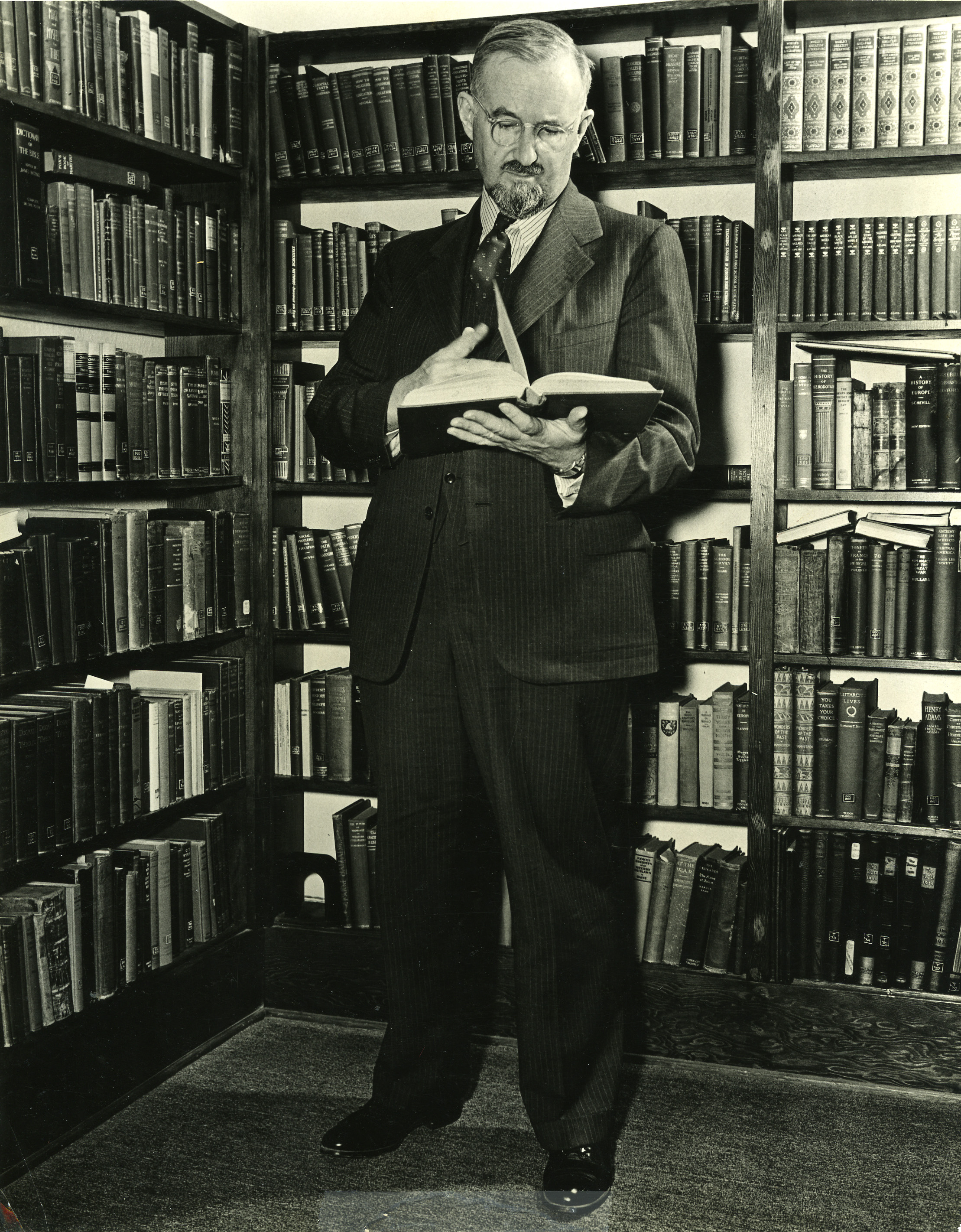 Wallace Emerson reading a book