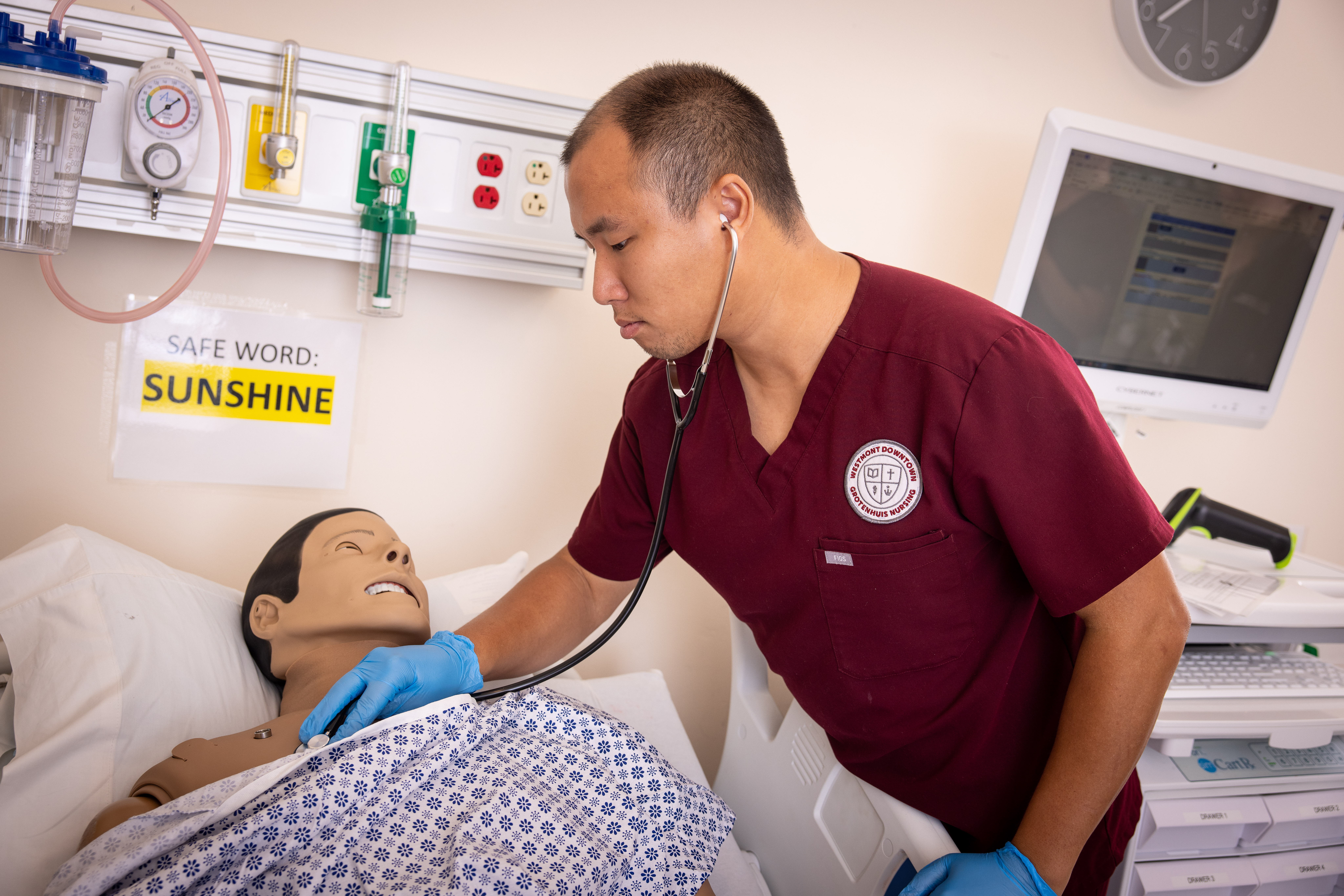 westmont nursing student listening to heartbeat