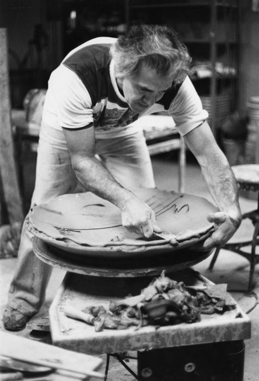 Reitz throwing a large platter, c. 1980