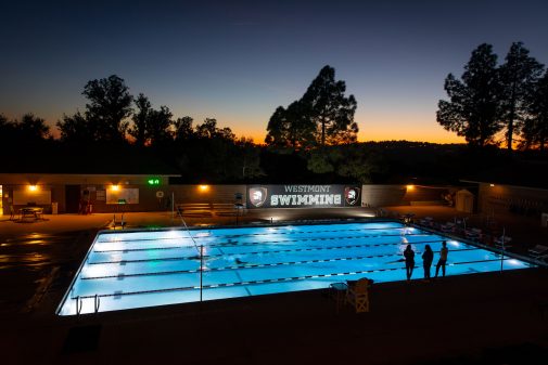 Westmont swimmers practice at sunset