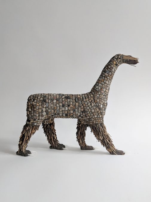 Leah Samuelson's "Real Dragon 1," wire, plaster, stone and wood mosaic, sea spines (2018)