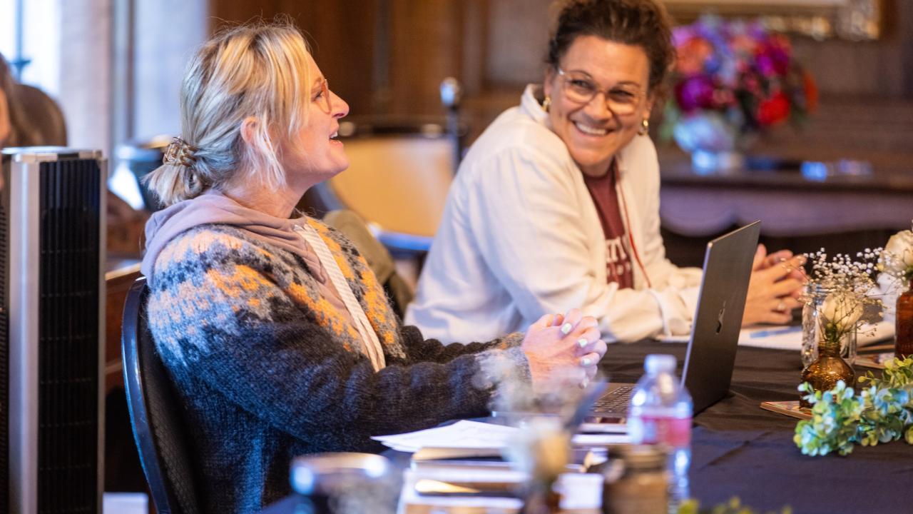 women in discussion during seminar