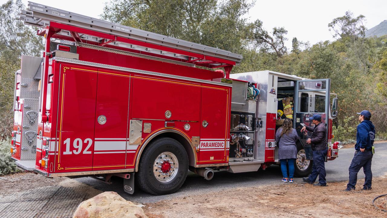 Montecito Fire truck giving visitors a tour of the inside of the truck.