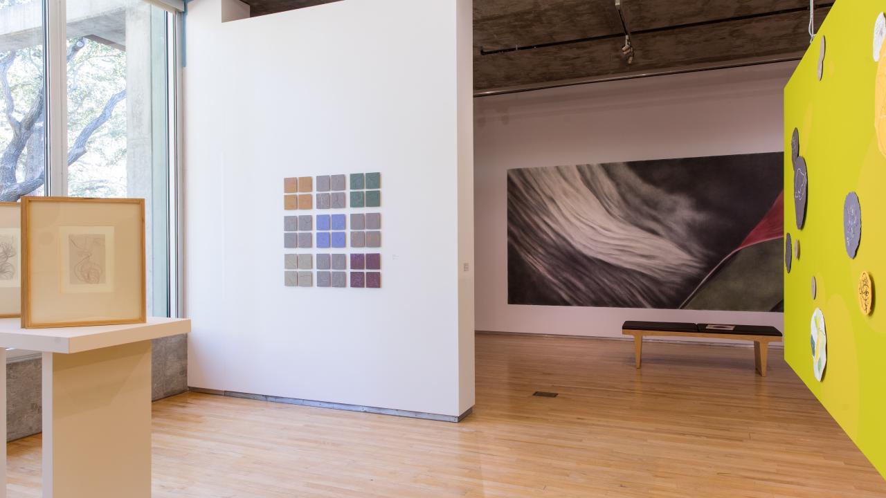 Gallery photograph picturing several works by Schoeff.