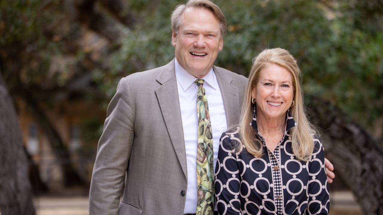 Westmont president Gayle Beebe and awardee Chris Emmons at luncheon.