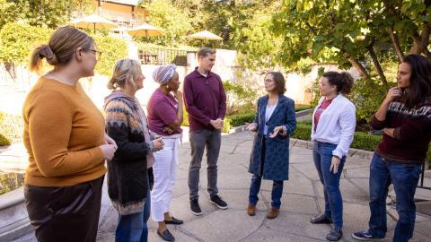 theological group chatting outside