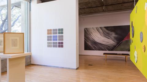 Gallery photograph picturing several works by Schoeff.