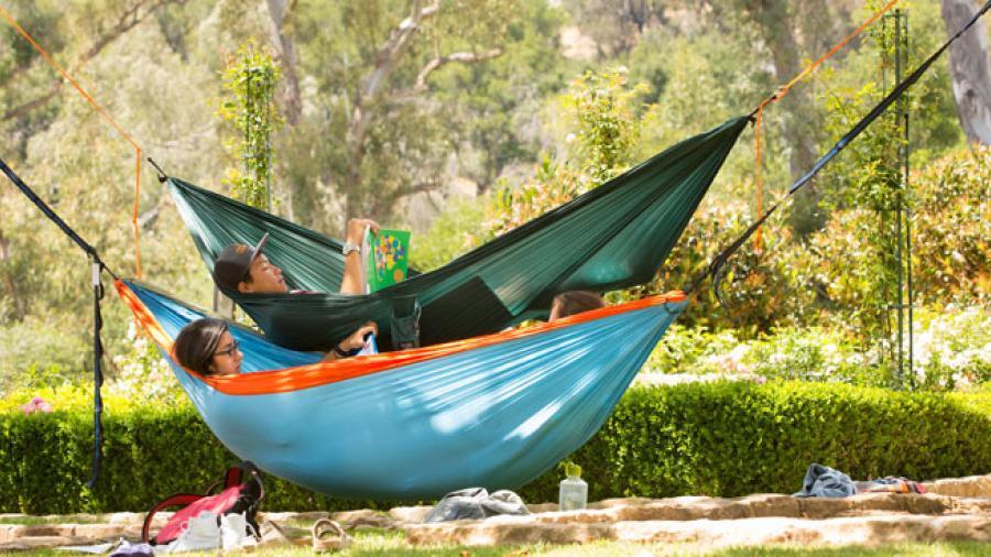 Student hammocking on campus