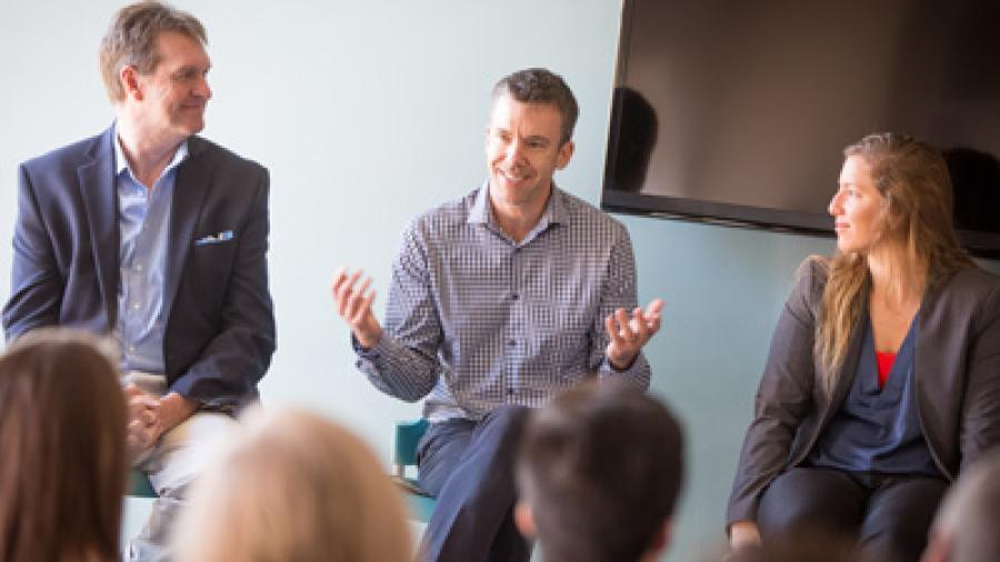 People on panel having conversation