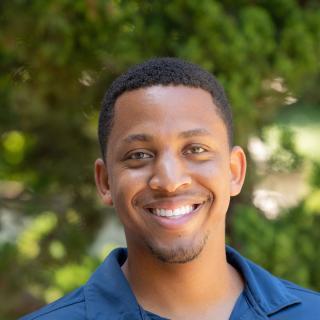 Blake Thomas, Interim Director of Intercultural Programs Headshot