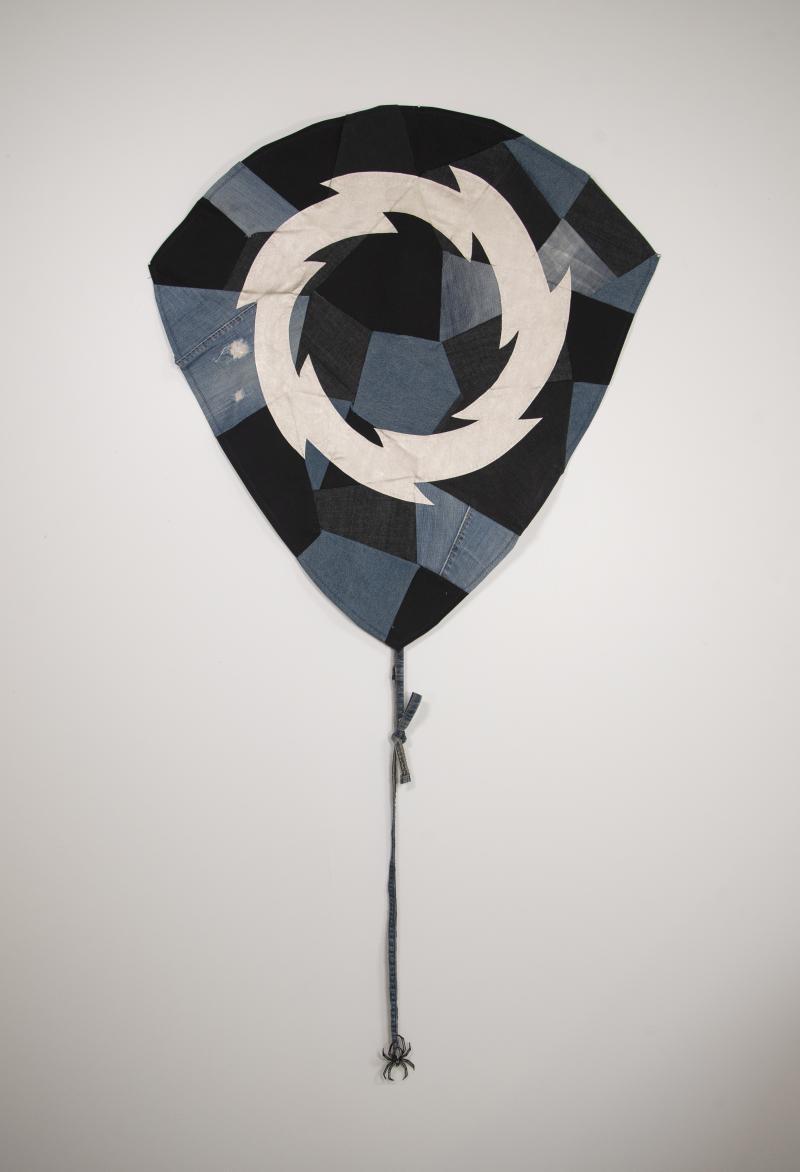 jean sculpture with spider at bottom