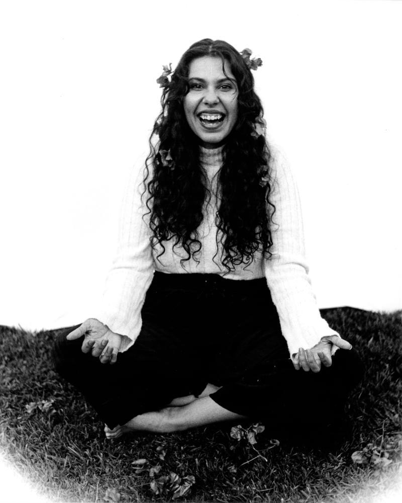 photo of figure with flowers in hair