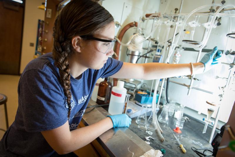 Chemistry student working in the lab.