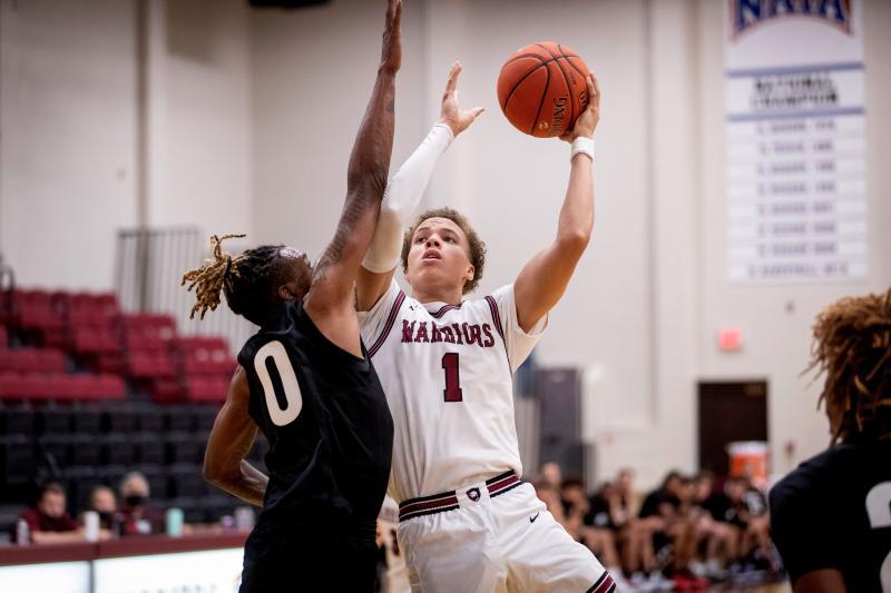 Nate Meithof playing basketball