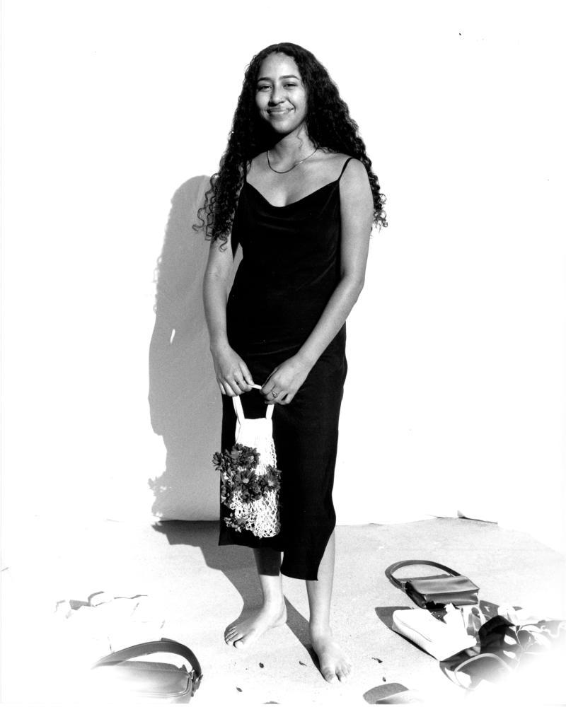 photo of figure with handbag