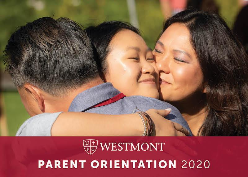 Parent Orientation photo 2 with banner, hugs