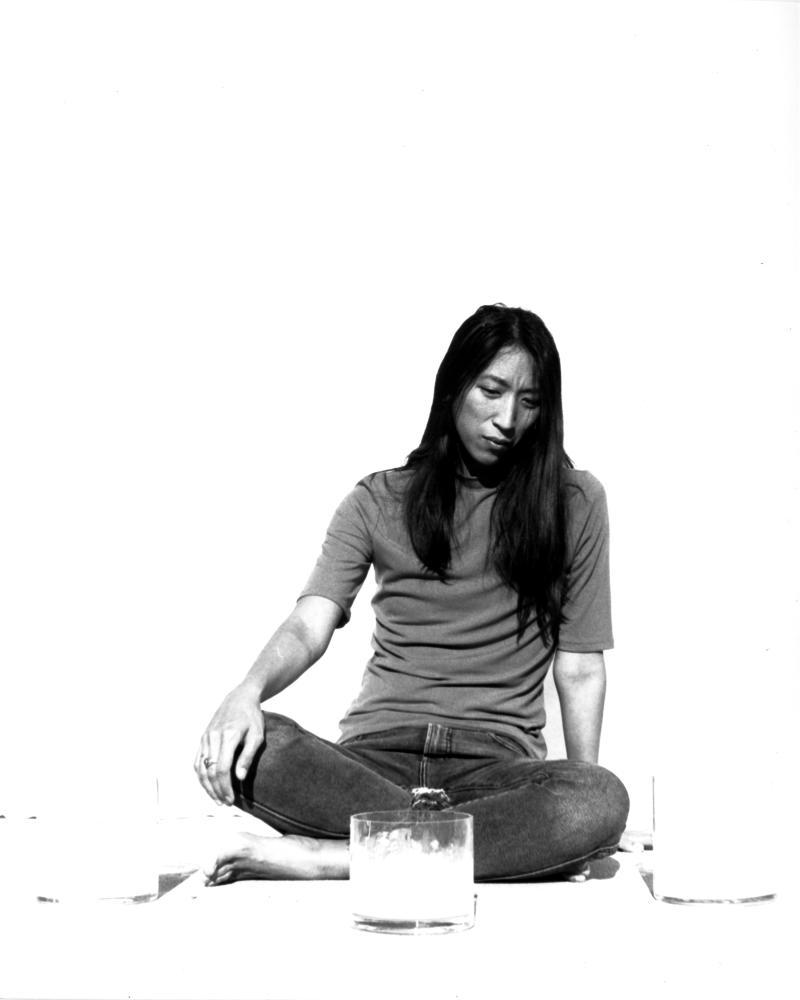 photo with figure with white paint bucket