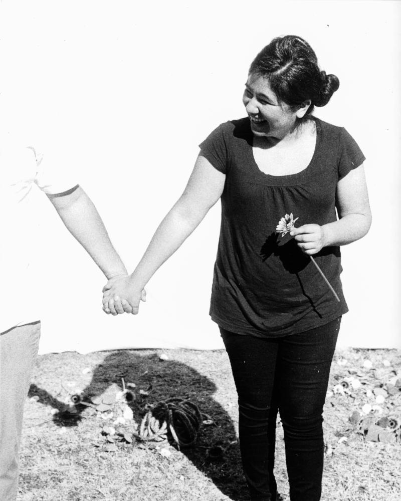 photo of figure holding another person's hand
