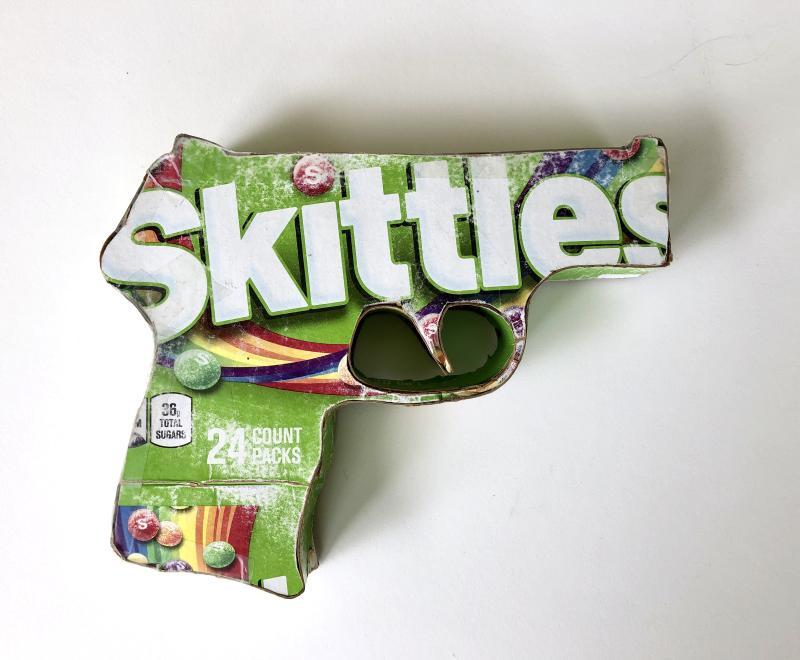 skittles wrapper shaped into gun