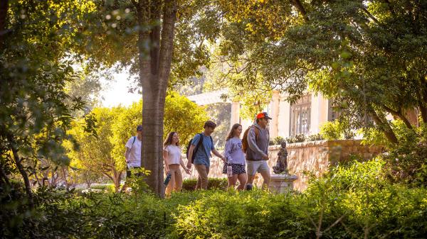 Students walk through the Formal Gardens