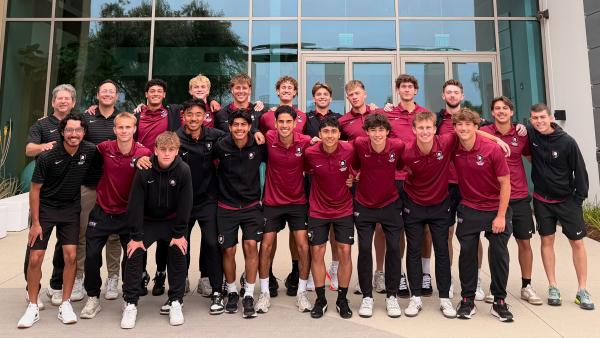 Men's soccer tours the Direct Relief facility