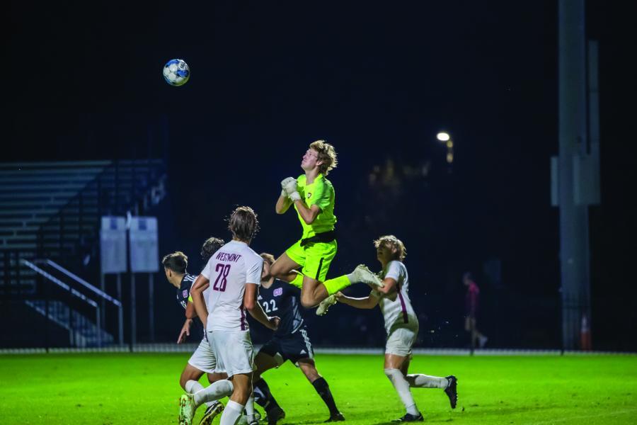 jumping for header men's soccer