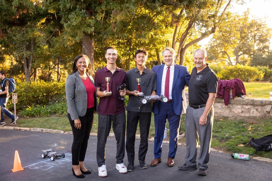 Winners Tim Horsey and Noah Shen pose with Provost Kim Denu, President Gayle D. Beebe and director Dan Jensen