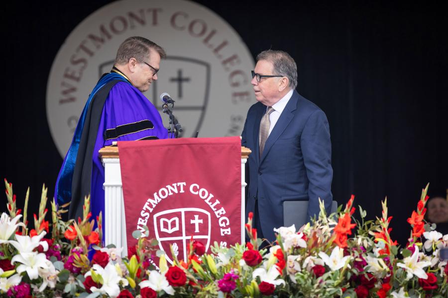 Gayle D. Beebe gives John Davies the Westmont Medal