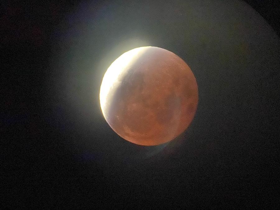 A partial eclipse of the moon (by Ken Kihlstrom)