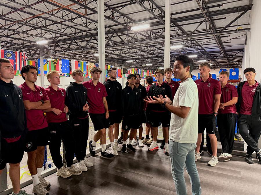 Men's soccer tours the Direct Relief facility