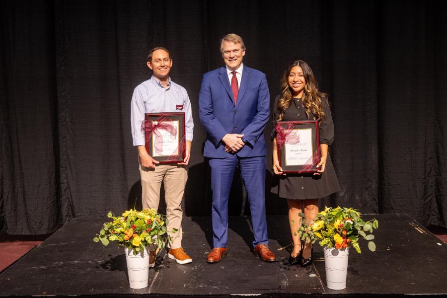 Employees of the Year: Joe Foster and Brenda Tirado with President Gayle D. Beebe