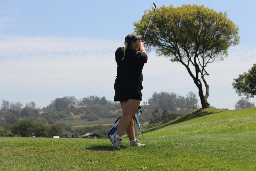 Kat Bevill plays golf