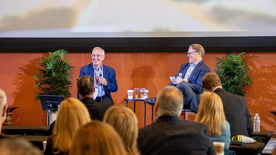 David Brooks and Gayle D. Beebe laugh at Lead Where You Stand