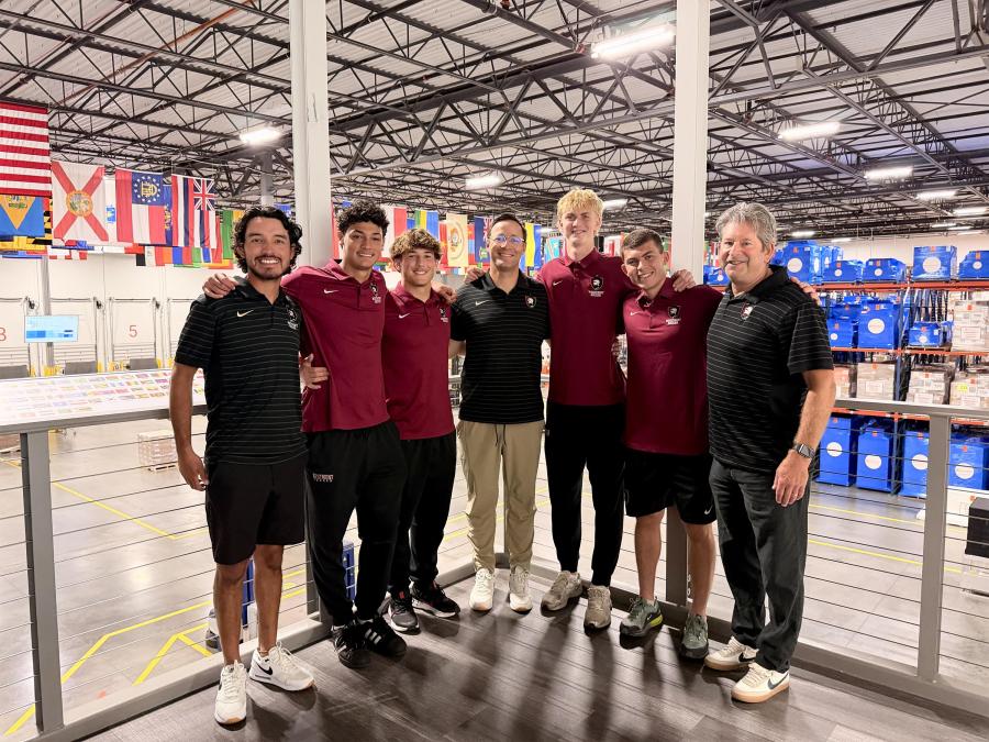 Men's soccer tours the Direct Relief facility