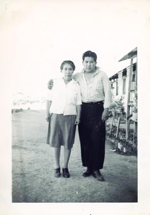 Paul’s father (Joe) and grandmother in front of the barracks at the camp in Gila River, Arizona.