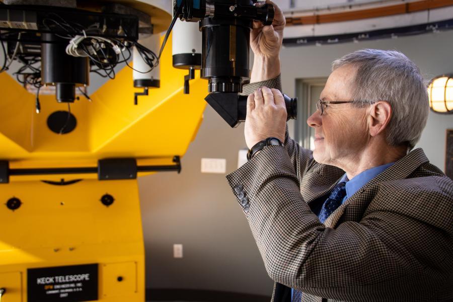 Dr. Michael Sommermann Looks through the Keck Telescope at the Westmont Observatory