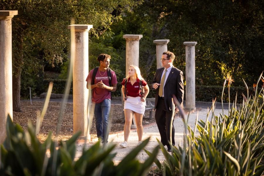 Students walk through the Formal Gardens