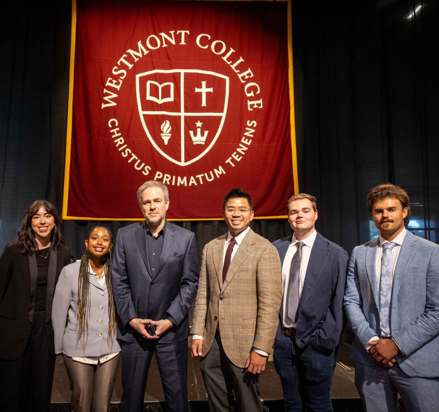 Student panelists pose with Bret Stephens at convocation