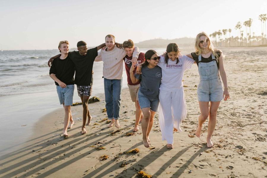 Students walk on East Beach 