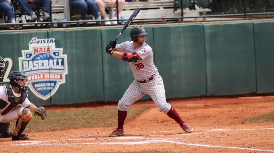 Josh Rego swings a bat at a baseball game